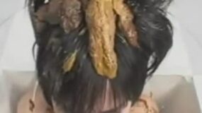 poo on the head of a woman
