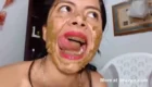 Beautiful latina smears her face with shit after taking a dump