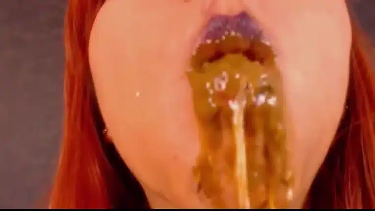 eating poo scat in mouth